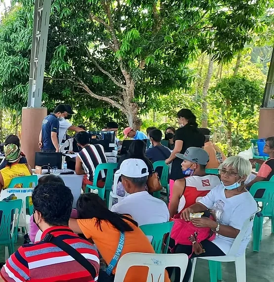 Authorized Rosario personnel assisting citizens with municipal records