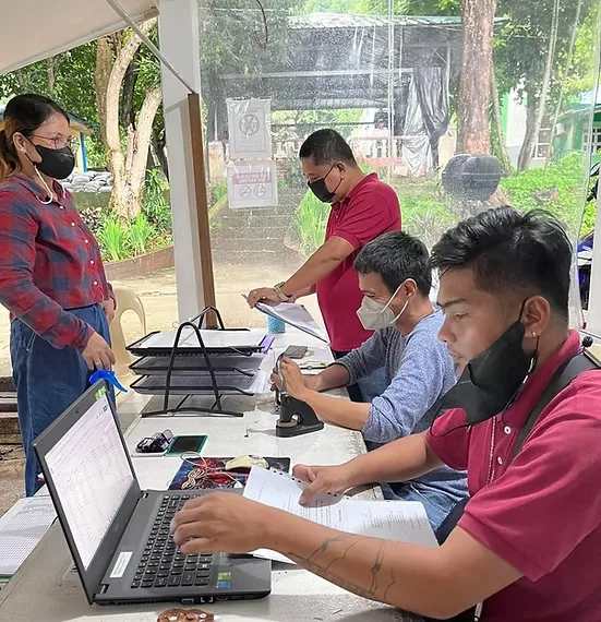 Rosario staff reviewing and encoding agricultural records